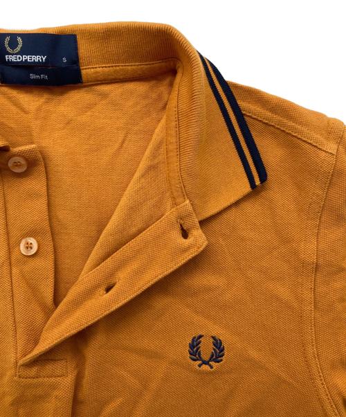 FRED PERRY（フレッドペリー）FRED PERRY (フレッドペリー) ポロシャツ オレンジ サイズ:Sの古着・服飾アイテム