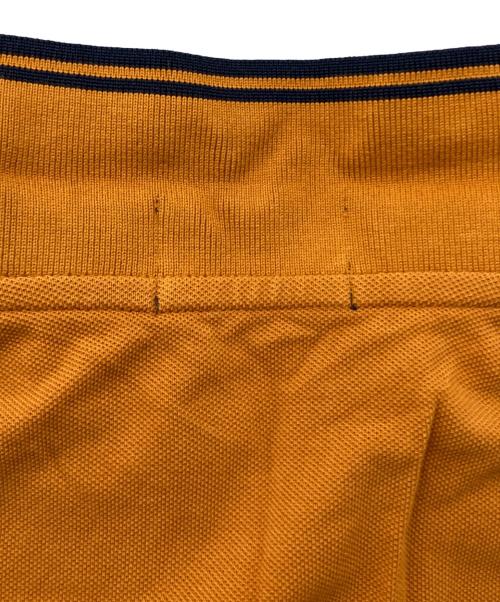 FRED PERRY（フレッドペリー）FRED PERRY (フレッドペリー) ポロシャツ オレンジ サイズ:Sの古着・服飾アイテム