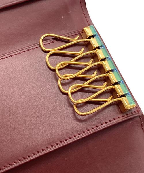 Cartier（カルティエ）Cartier (カルティエ) 6連キーケース ボルドーの古着・服飾アイテム