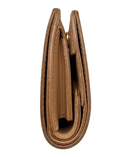 WILDSWANS（ワイルドスワンズ）WILDSWANS (ワイルドスワンズ) 2つ折り財布 ベージュの古着・服飾アイテム