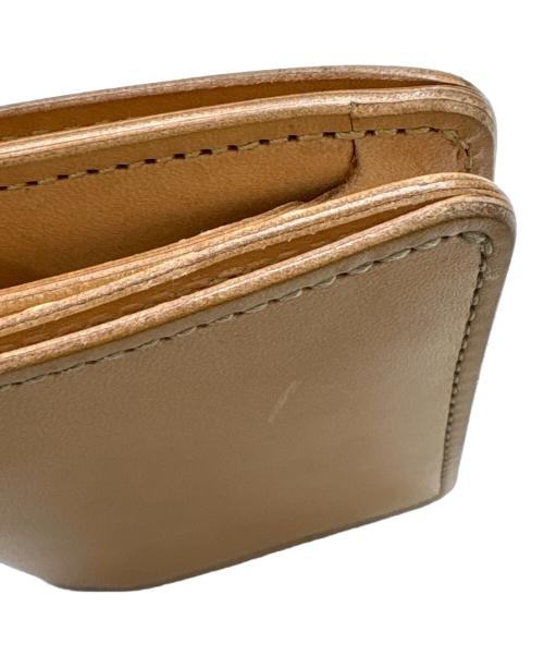 WILDSWANS（ワイルドスワンズ）WILDSWANS (ワイルドスワンズ) 2つ折り財布 ベージュの古着・服飾アイテム