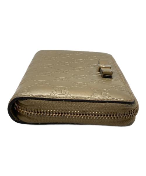 GUCCI（グッチ）GUCCI (グッチ) ラウンドファスナー財布 ゴールドの古着・服飾アイテム