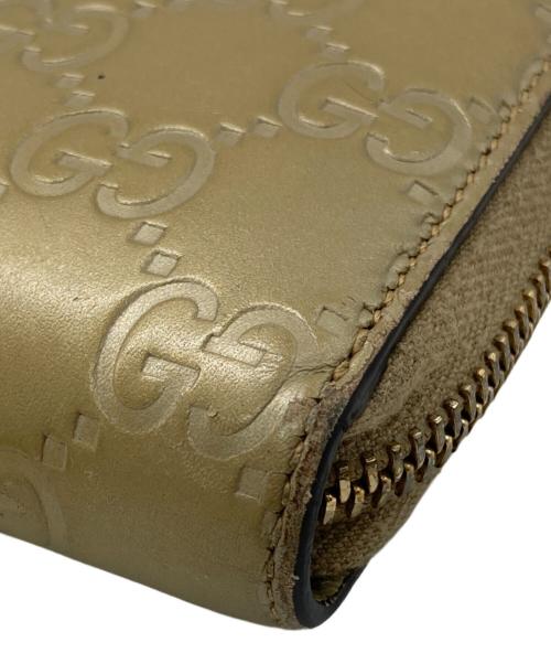 GUCCI（グッチ）GUCCI (グッチ) ラウンドファスナー財布 ゴールドの古着・服飾アイテム