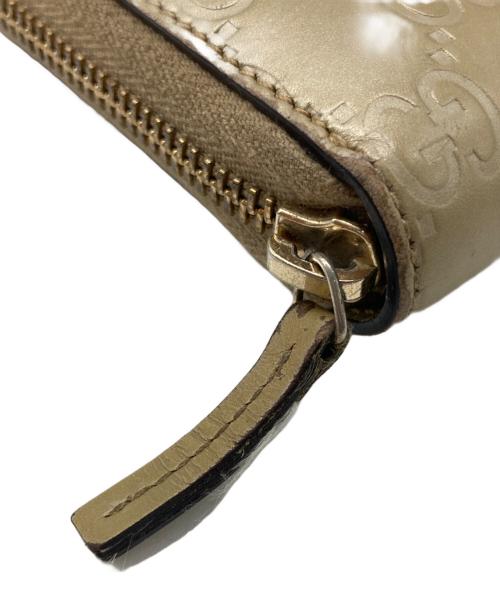 GUCCI（グッチ）GUCCI (グッチ) ラウンドファスナー財布 ゴールドの古着・服飾アイテム