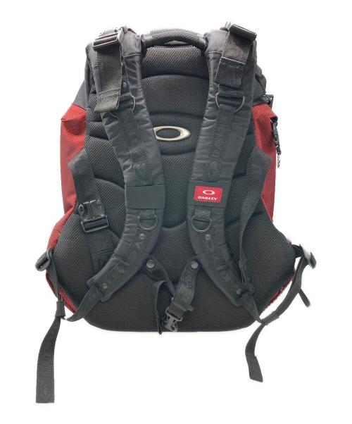 OAKLEY（オークリー）OAKLEY (オークリー) オバールロゴテックギミックバックパック レッド×ブラックの古着・服飾アイテム