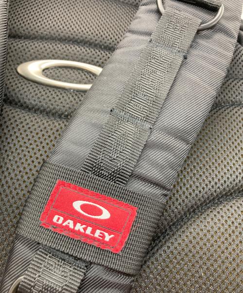OAKLEY（オークリー）OAKLEY (オークリー) オバールロゴテックギミックバックパック レッド×ブラックの古着・服飾アイテム