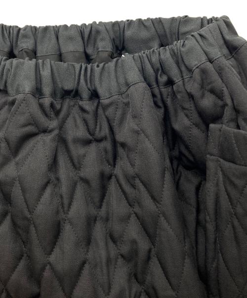 TAO COMME des GARCONS（タオ コムデギャルソン）TAO COMME des GARCONS (タオ コムデギャルソン) エステルヘリンボンキルティング ウエストゴムスカート ブラック サイズ:-の古着・服飾アイテム