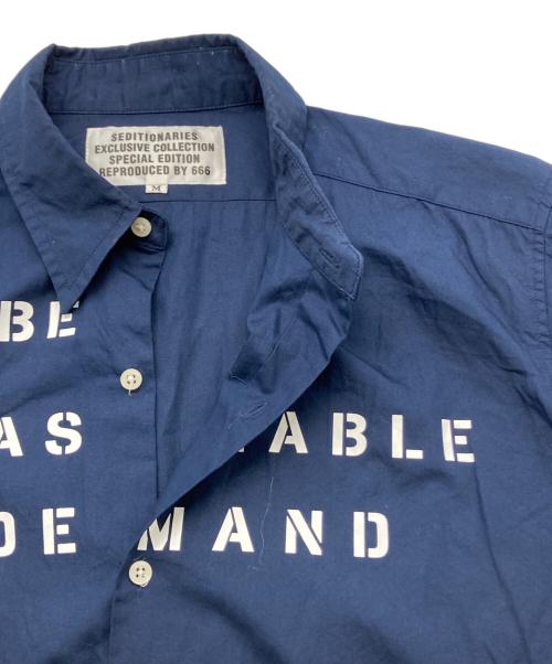 SEDITIONARIES by 666（セディショナリーズ）SEDITIONARIES by 666 (セディショナリーズ) スローガンシャツ ネイビー サイズ:SIZE Mの古着・服飾アイテム