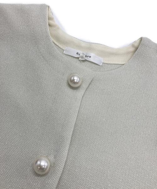 Rirandture（リランドチュール）Rirandture (リランドチュール) パールボタンラメクロップドニットジャケット アイボリー サイズ:2の古着・服飾アイテム