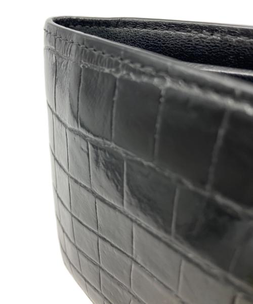 BOTTEGA VENETA（ボッテガベネタ）BOTTEGA VENETA (ボッテガベネタ) 型押し二つ折り財布 ブラックの古着・服飾アイテム