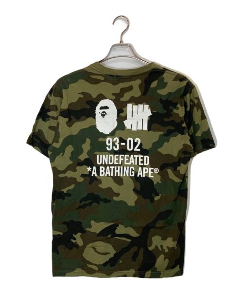 A BATHING APE（アベイシングエイプ）A BATHING APE (アベイシングエイプ) UNDEFEATED (アンディフィーテッド) サルカモTシャツ オリーブ サイズ:Ⅿの古着・服飾アイテム