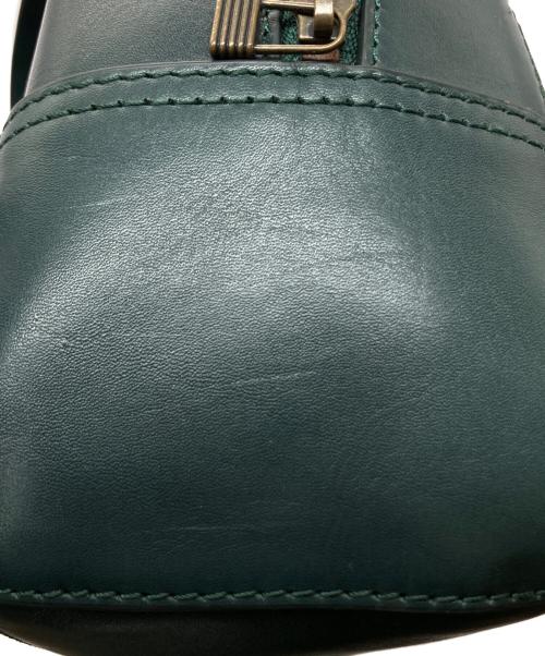 MOTHERHOUSE（マザーハウス）MOTHERHOUSE (マザーハウス) アンティーク スクエア バックパック グリーンの古着・服飾アイテム