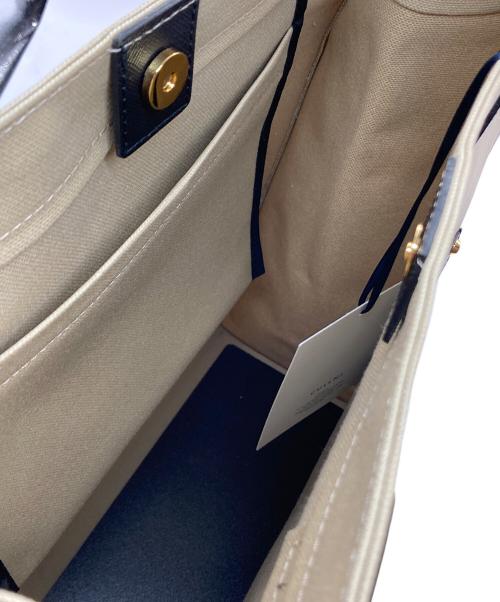 CULLNI（クルニ）CULLNI (クルニ) Leather Pocket Canvas Tote Bag ベージュの古着・服飾アイテム