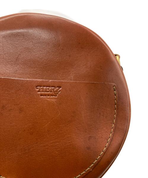 Herz（ヘルツ）Herz (ヘルツ) まんまるショルダーポシェット ブラウンの古着・服飾アイテム