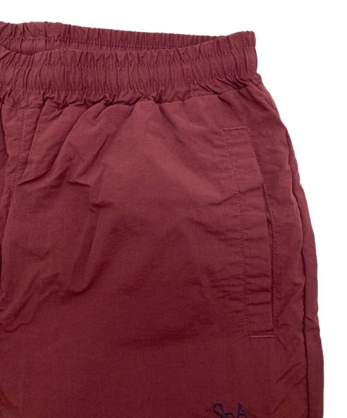 Sea Room lynn（シールームリン）Sea Room Lynn (シールームリン) UMBRO (アンブロ) ナイロントラックパンツ ボルドー サイズ:Ⅿの古着・服飾アイテム