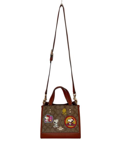 COACH（コーチ）COACH (コーチ) PEANUTS (ピーナッツ) デンプシー トート 22・シグネチャー キャンバス・パッチ ブラウンの古着・服飾アイテム
