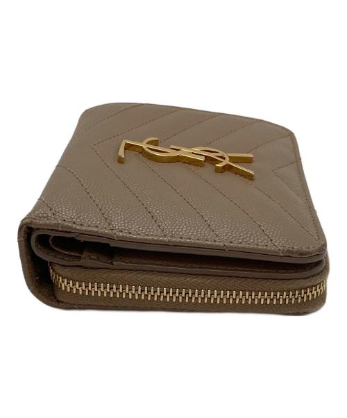 Saint Laurent Paris（サンローランパリ）Saint Laurent Paris (サンローランパリ) モノグラム コンパクト ジップアラウンド ウォレット ベージュの古着・服飾アイテム