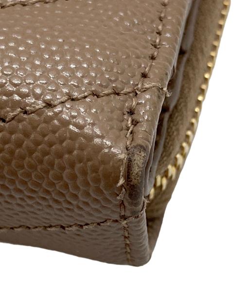 Saint Laurent Paris（サンローランパリ）Saint Laurent Paris (サンローランパリ) モノグラム コンパクト ジップアラウンド ウォレット ベージュの古着・服飾アイテム