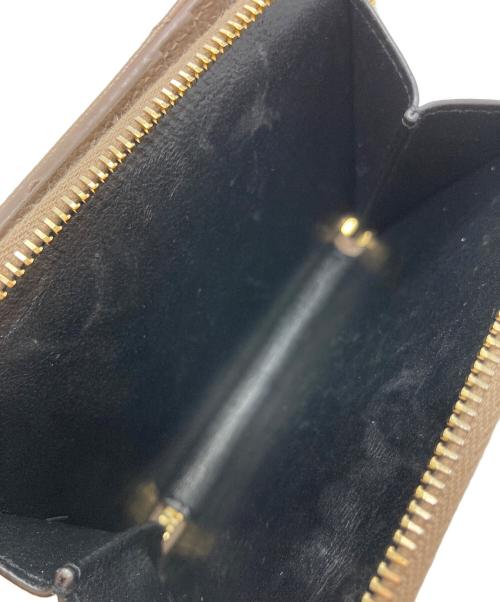 Saint Laurent Paris（サンローランパリ）Saint Laurent Paris (サンローランパリ) モノグラム コンパクト ジップアラウンド ウォレット ベージュの古着・服飾アイテム