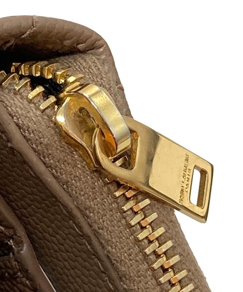 Saint Laurent Paris（サンローランパリ）Saint Laurent Paris (サンローランパリ) モノグラム コンパクト ジップアラウンド ウォレット ベージュの古着・服飾アイテム
