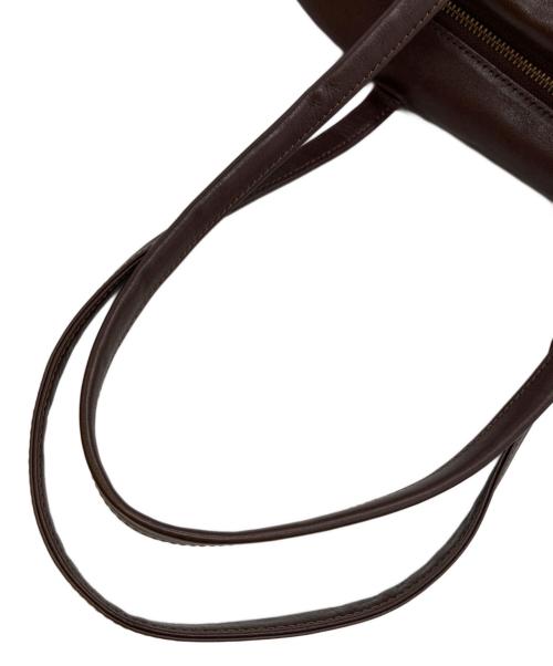 kurashi&trips publishing（クラシアンドトリップス パブリッシング）KURASHI&Trips PUBLISHING (クラシアンドトリップス パブリッシング) 「がんばりどきも私らしく」 一田憲子さんとつくったラウンドレザーバッグ ブラウンの古着・服飾アイテム