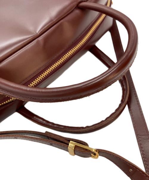 FELISSIMO（フェリシモ）FELISSIMO (フェリシモ) ファッションスタイリストと作った 職人本革のエチューデントバッグ バーガンディーの古着・服飾アイテム