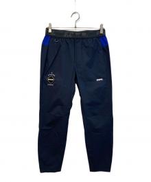 F.C.R.B.（エフシーレアルブリストル）の古着「STRETCH LIGHT WEIGHT EASY TAPERED PANTS」｜ネイビー