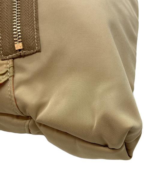 OUTDOOR PRODUCTS（アウトドア プロダクツ）OUTDOOR PRODUCTS (アウトドア プロダクツ) Risley (リズレー) トライアングルフリルバッグ ベージュ×オレンジの古着・服飾アイテム