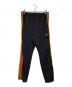 Needles（ニードルズ）の古着「トラックパンツ」｜ブラウン