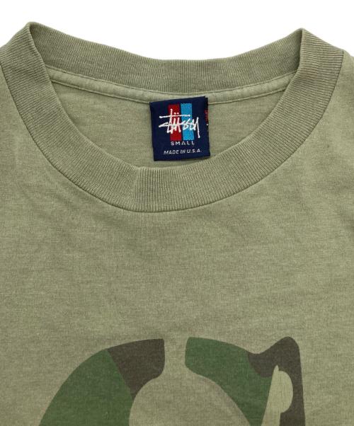 stussy（ステューシー）stussy (ステューシー) プリントTシャツ カーキ サイズ:Sの古着・服飾アイテム