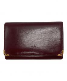 Cartier（カルティエ）の古着「マストライン 2つ折り財布」｜バーガンディー