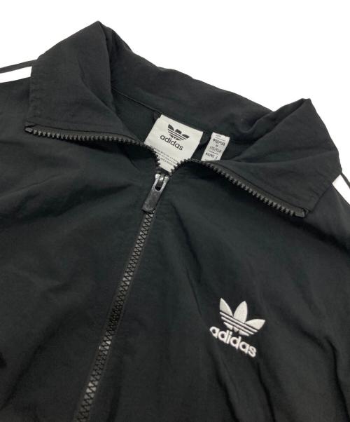 adidas（アディダス）adidas (アディダス) アディカラー ウーブン ファイヤーバード トラックトップ ブラック サイズ:Lの古着・服飾アイテム