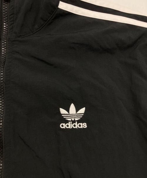 adidas（アディダス）adidas (アディダス) アディカラー ウーブン ファイヤーバード トラックトップ ブラック サイズ:Lの古着・服飾アイテム