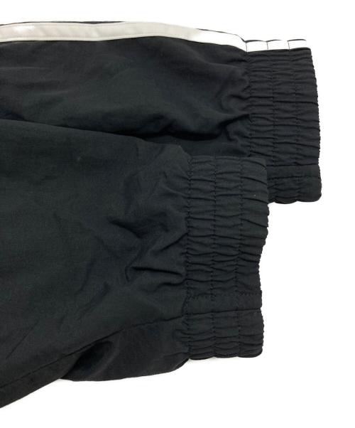 adidas（アディダス）adidas (アディダス) アディカラー ウーブン ファイヤーバード トラックトップ ブラック サイズ:Lの古着・服飾アイテム