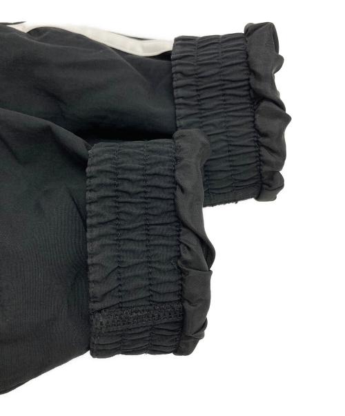 adidas（アディダス）adidas (アディダス) アディカラー ウーブン ファイヤーバード トラックトップ ブラック サイズ:Lの古着・服飾アイテム