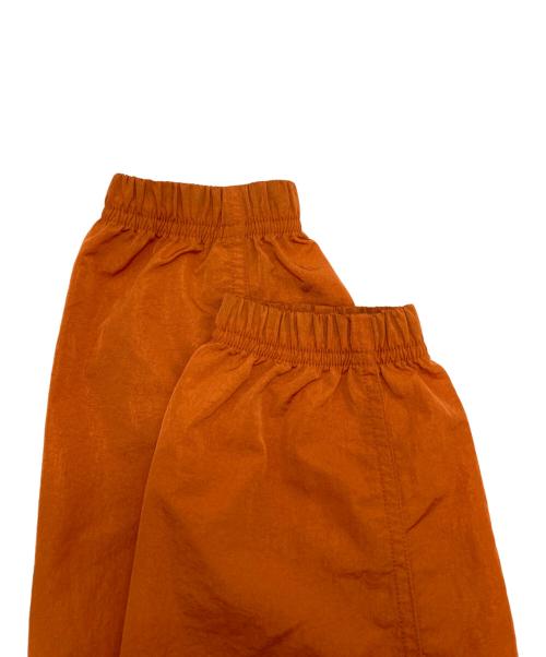 UMBRO（アンブロ）UMBRO (アンブロ) ナイロンメタルスタンネックウォームアップジャケット オレンジ サイズ:SIZE 100の古着・服飾アイテム