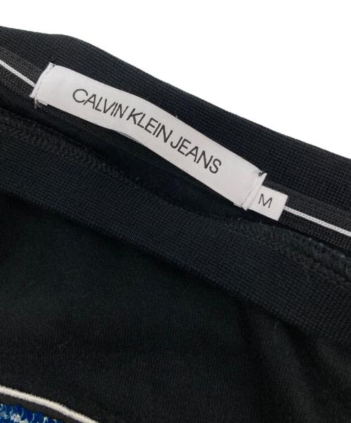 Calvin Klein Jeans（カルバンクラインジーンズ）Calvin Klein Jeans (カルバンクラインジーンズ) スパンコールスウェット ブラック サイズ:Ⅿの古着・服飾アイテム
