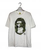 A BATHING APE×UNDEFEATEDアベイシングエイプ×アンディフィーテッド）の古着「プリントTシャツ」｜ホワイト