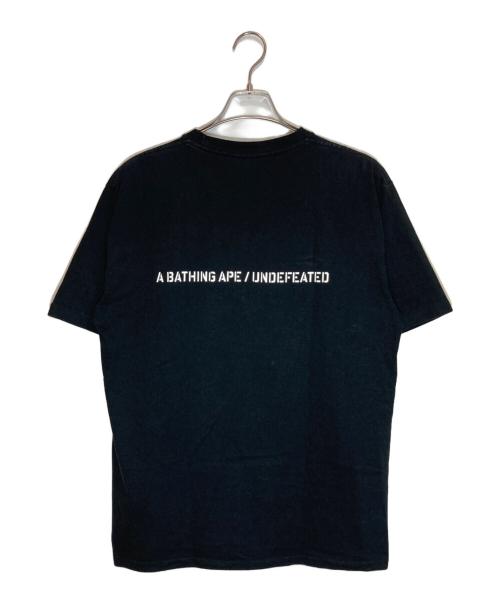 A BATHING APE（アベイシングエイプ）A BATHING APE (アベイシングエイプ) UNDEFEATED (アンディフィーテッド) プリントTシャツ ブラック サイズ:XLの古着・服飾アイテム
