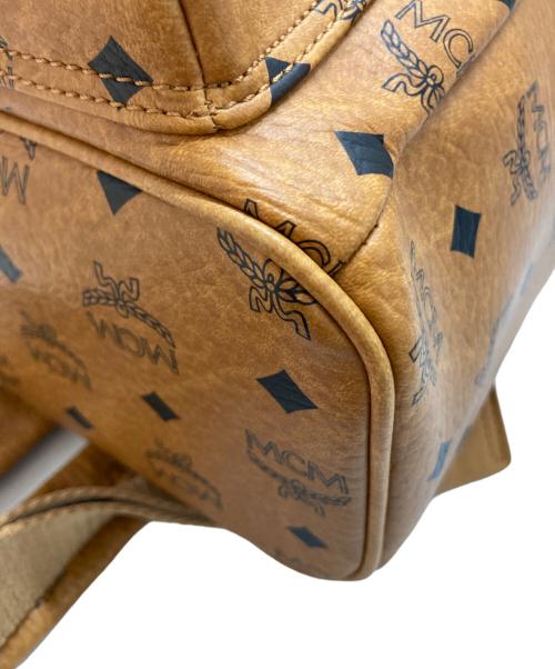 MCM（エムシーエム）MCM (エムシーエム) スタッズリュック ブラウンの古着・服飾アイテム
