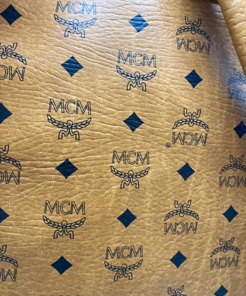MCM（エムシーエム）MCM (エムシーエム) スタッズリュック ブラウンの古着・服飾アイテム