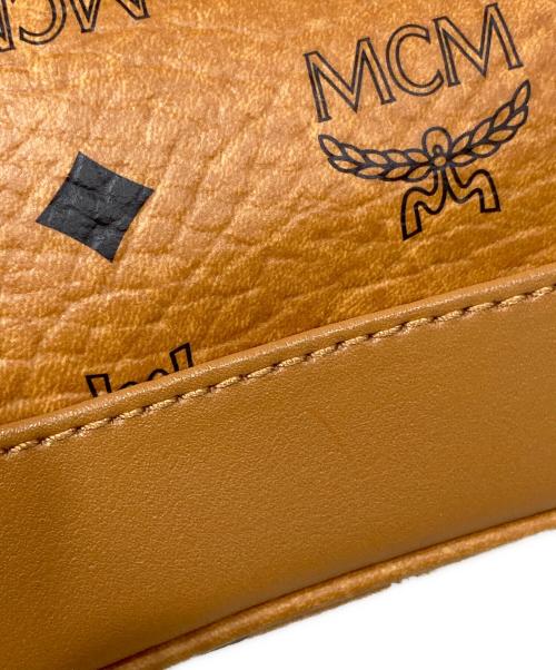 MCM（エムシーエム）MCM (エムシーエム) スタッズリュック ブラウンの古着・服飾アイテム
