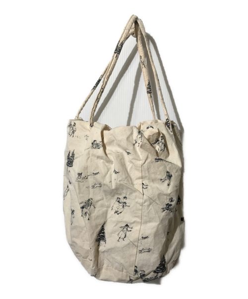 R&D.M.Co-OLDMAN'S TAILOR（オールドマンズテイラー）R&D.M.Co-OLDMAN'S TAILOR (オールドマンズテイラー) プリント巾着バッグ アイボリーの古着・服飾アイテム