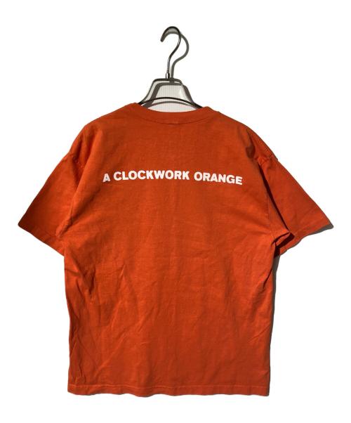 Dumbgood（ダムグッド）Dumbgood (ダムグッド) A Clockwork Orange プリントTシャツ オレンジ サイズ:Mの古着・服飾アイテム