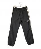 UMBRO×Diaspora Skateboardsアンブロ×ディアスポラスケートボードズ）の古着「ナイロンパンツ/フットボールトラックパンツ」｜グレー