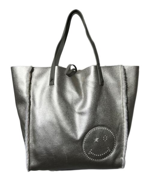 SALON DE ALFURD（サロン・ド・アルファード）SALON DE ALFURD (サロン・ド・アルファード) フェイクムートンスマイルパンチングトートバッグ シルバーの古着・服飾アイテム