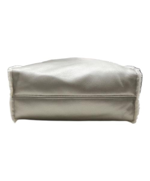 SALON DE ALFURD（サロン・ド・アルファード）SALON DE ALFURD (サロン・ド・アルファード) フェイクムートンスマイルパンチングトートバッグ シルバーの古着・服飾アイテム