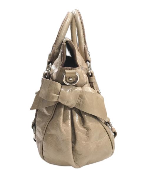 MIU MIU（ミュウミュウ）MIU MIU (ミュウミュウ) サイドリボン2wayレザーバッグ ベージュの古着・服飾アイテム