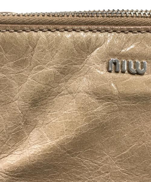 MIU MIU（ミュウミュウ）MIU MIU (ミュウミュウ) サイドリボン2wayレザーバッグ ベージュの古着・服飾アイテム