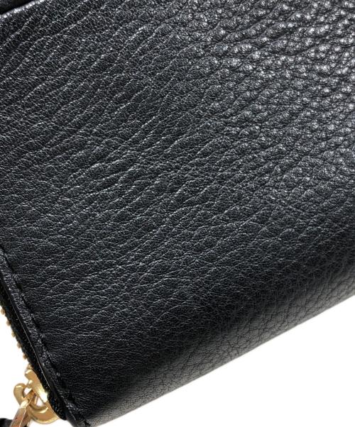 TORY BURCH（トリーバーチ）TORY BURCH (トリーバーチ) ラウンドファスナー財布 ブラックの古着・服飾アイテム